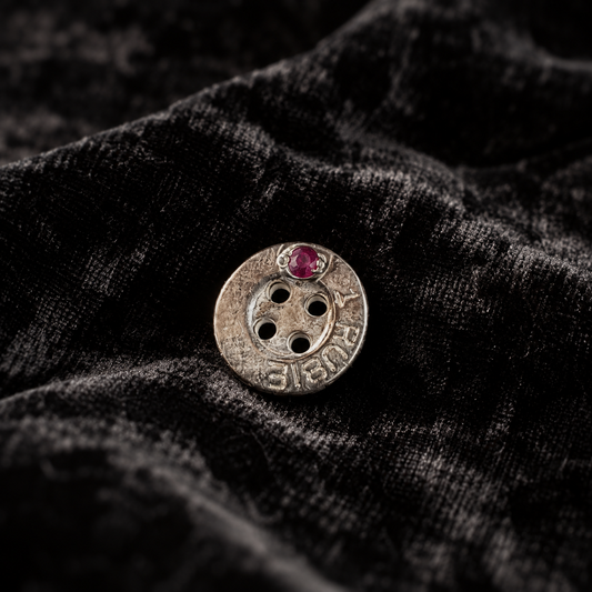 TRAVELING BUTTON. SHIRT
